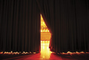 Theatre in education. The image shows a pair of theatre curtains